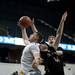 Saline junior Max Recknagel recovers a rebound against Dexter defenders on Friday, Jan. 4. Saline defeated Dexter 43-37. Daniel Brenner I AnnArbor.com